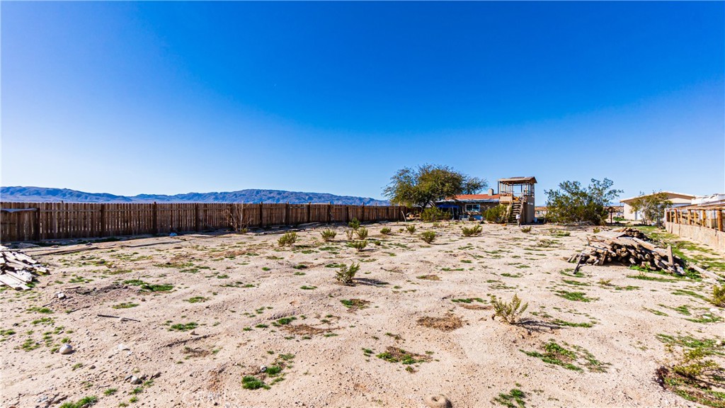 3606 Mojave Road Twentynine Palms, CA 92277 - Photo 38 of 47 a view of wooden fence and covered with snow
