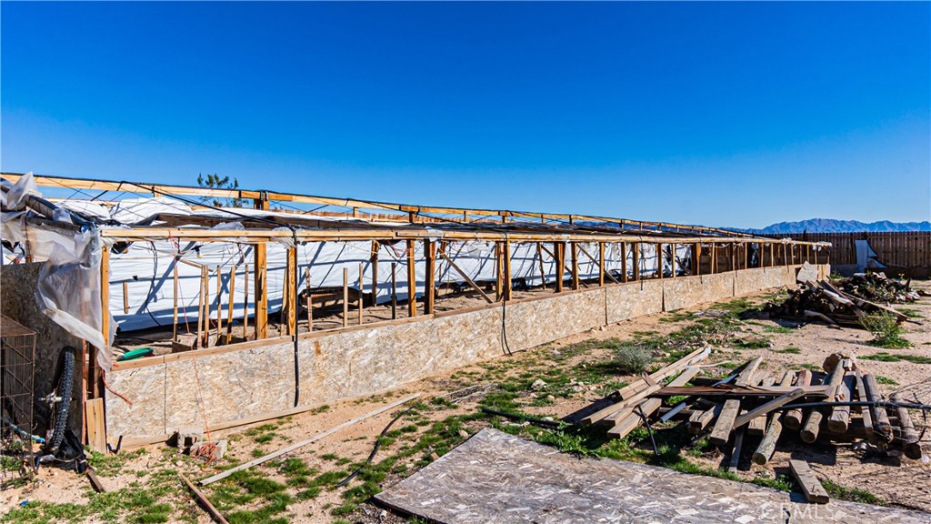 3606 Mojave Road Twentynine Palms, CA 92277 - Photo 40 of 47 a view of a swimming pool with an outdoor seating