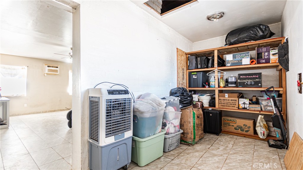 3606 Mojave Road Twentynine Palms, CA 92277 - Photo 10 of 47 a view of a storage and utility room with racks