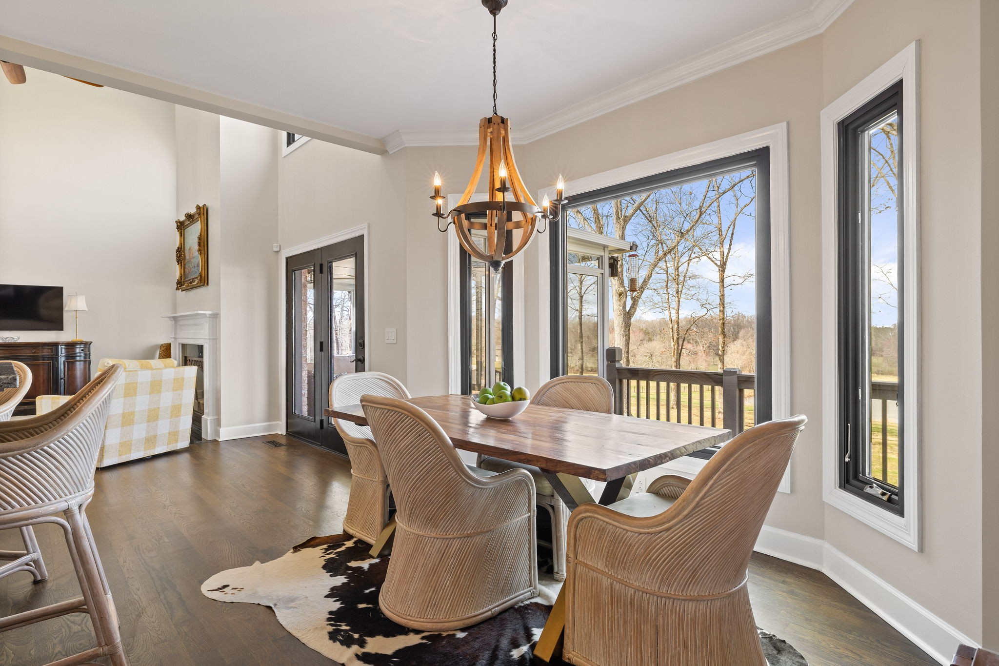 1640 Eno Road Dickson, TN 37055 - Photo 15 of 58 a dining room with furniture a chandelier and wooden floor