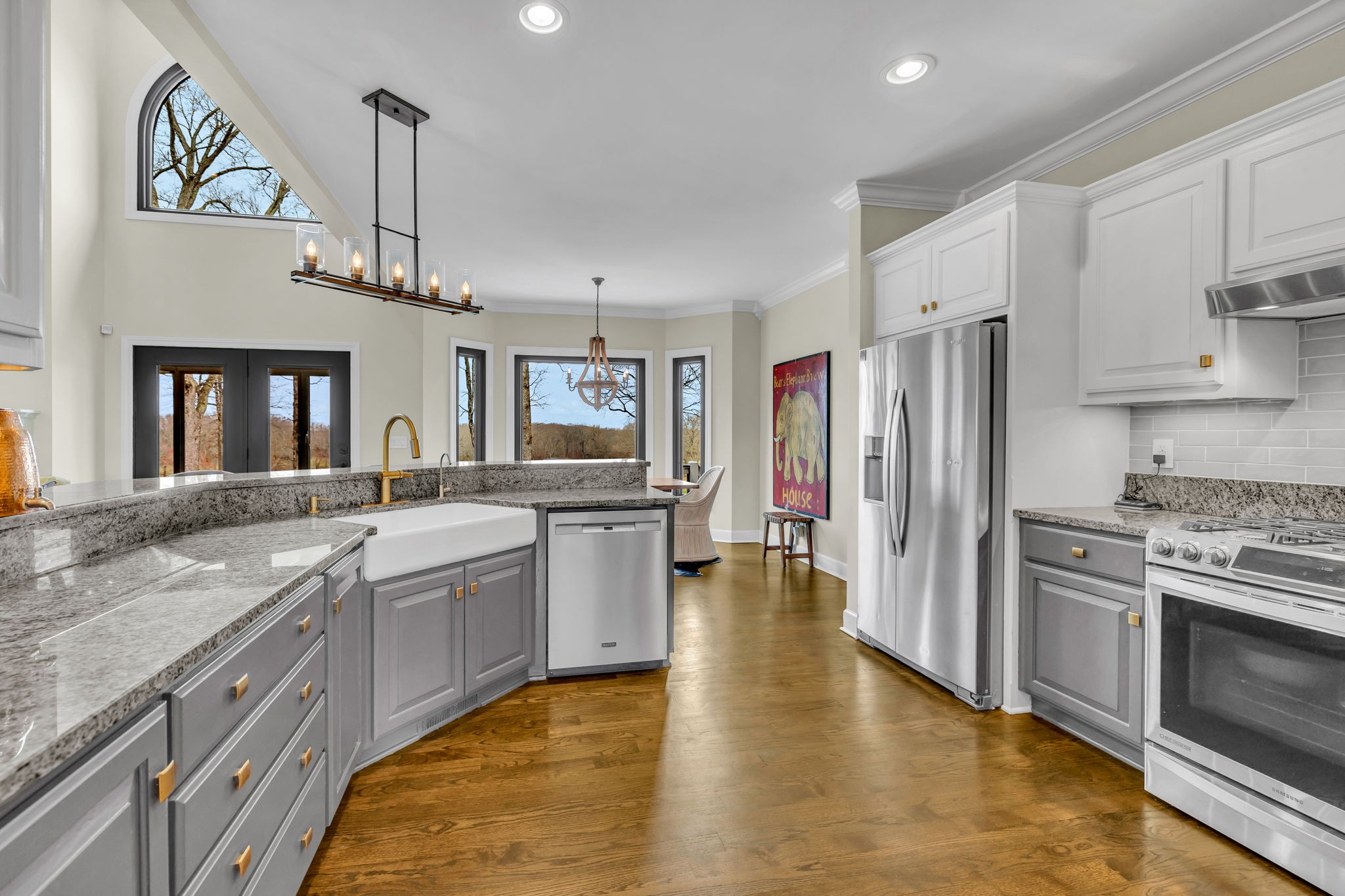 1640 Eno Road Dickson, TN 37055 - Photo 17 of 58 a kitchen with stainless steel appliances granite countertop a stove refrigerator and cabinets