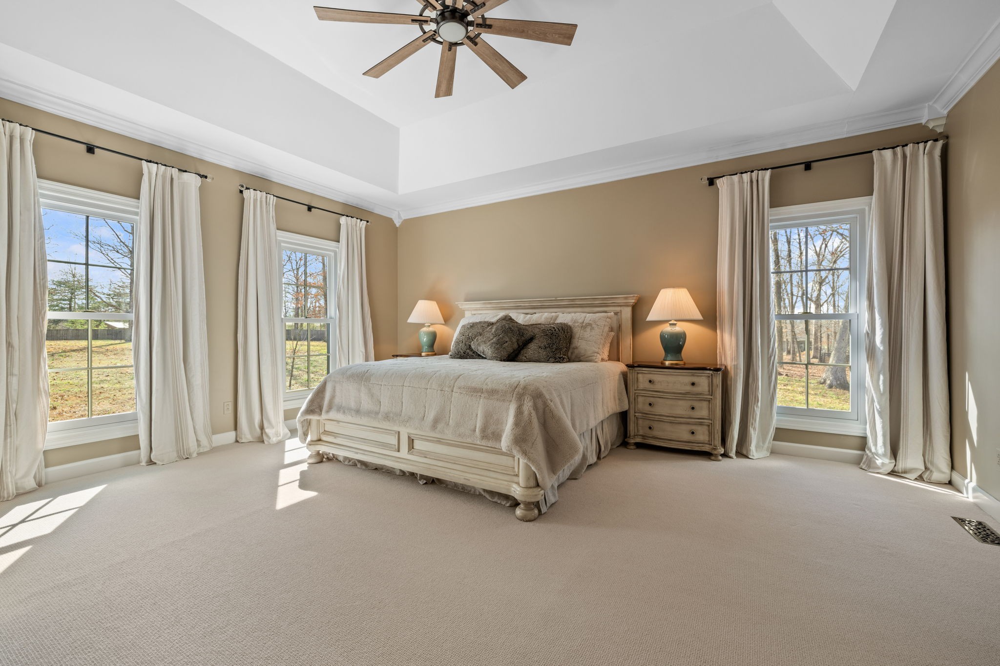 1640 Eno Road Dickson, TN 37055 - Photo 32 of 58 a bedroom with a bed and a chandelier