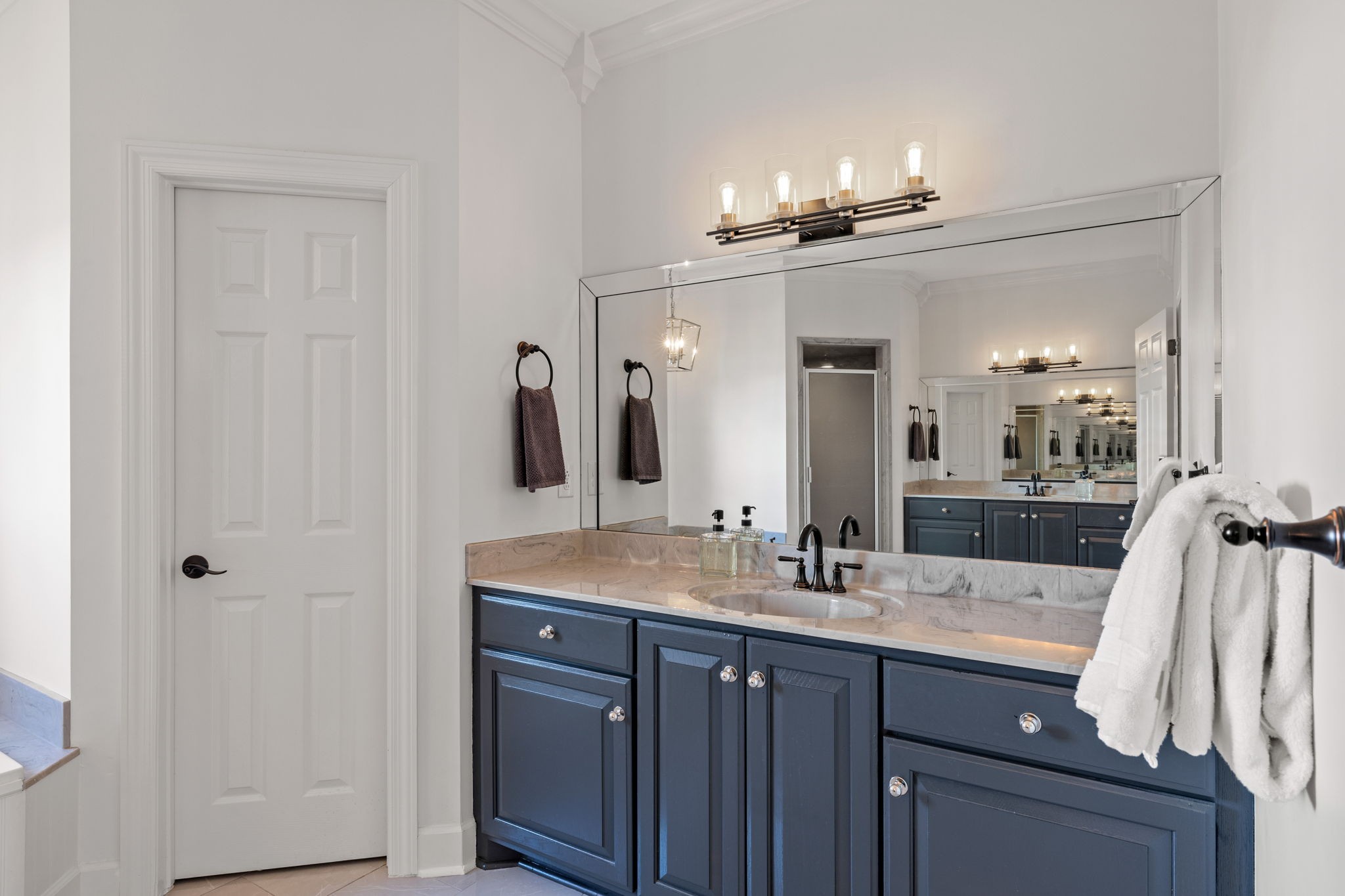 1640 Eno Road Dickson, TN 37055 - Photo 36 of 58 a bathroom with a double vanity sink and a mirror