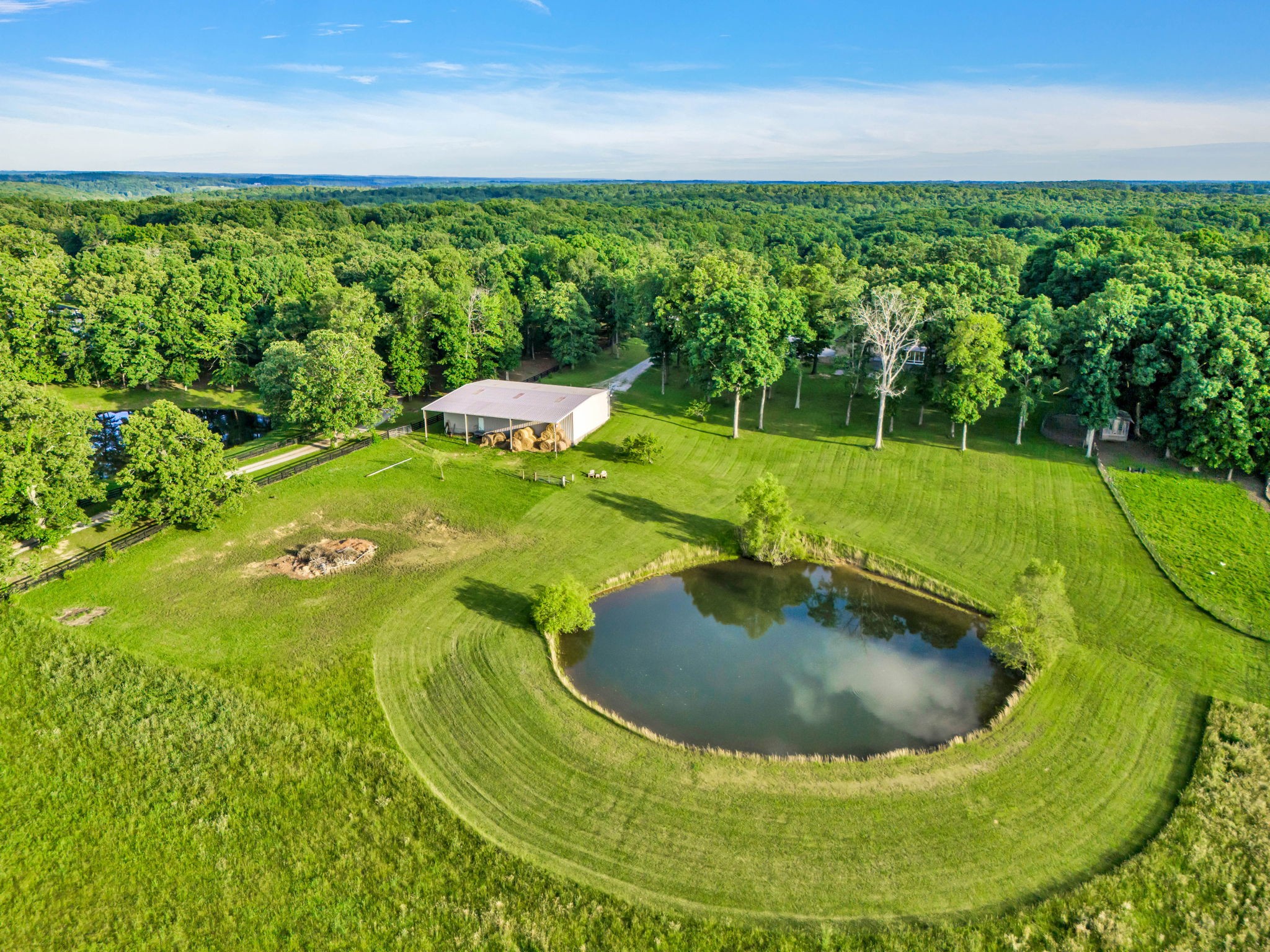 1640 Eno Road Dickson, TN 37055 - Photo 48 of 58 a view of a swimming pool with a yard
