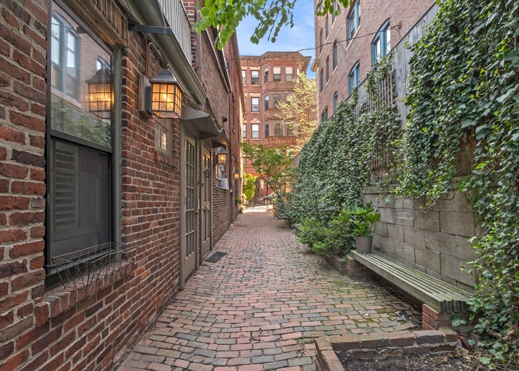 36 Joy Street, Unit F2 Boston, MA 02114 - Photo 16 of 17 a view of a pathway both side of building