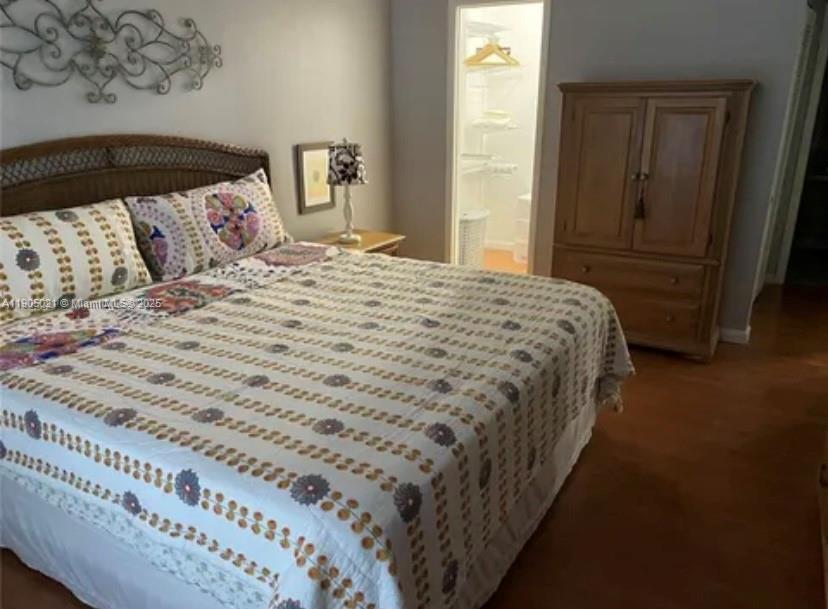 13781 Southwest 66th Street, Unit 229B Miami, FL 33183 - Photo 4 of 6 a bedroom with a bed and a window