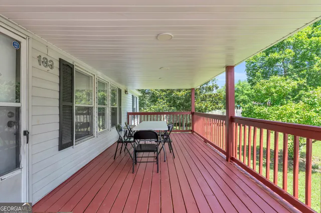 a view of a chairs on the roof deck