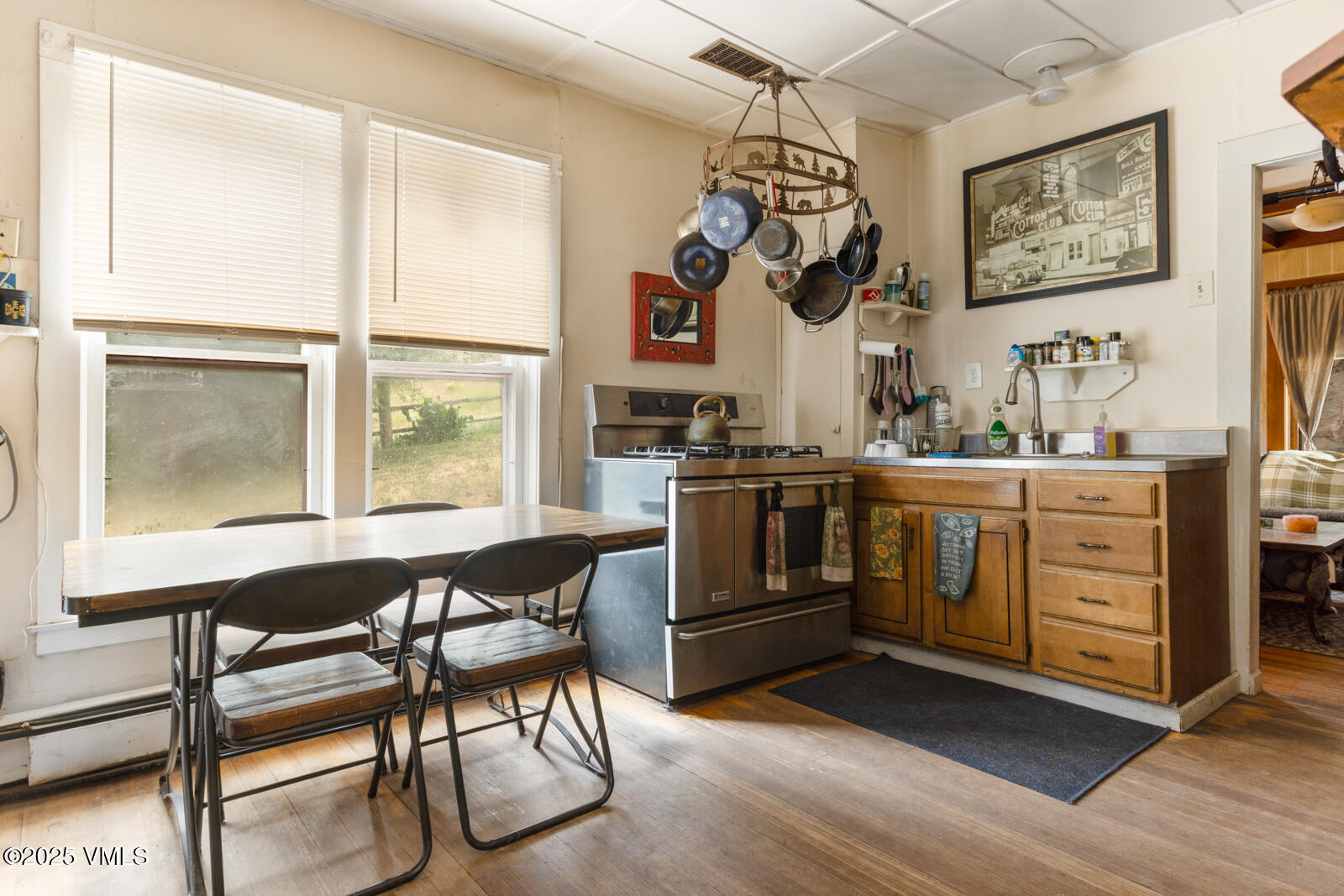 407 Water Street Red Cliff, CO 81649 - Photo 15 of 25 a view of a dining room with furniture and window
