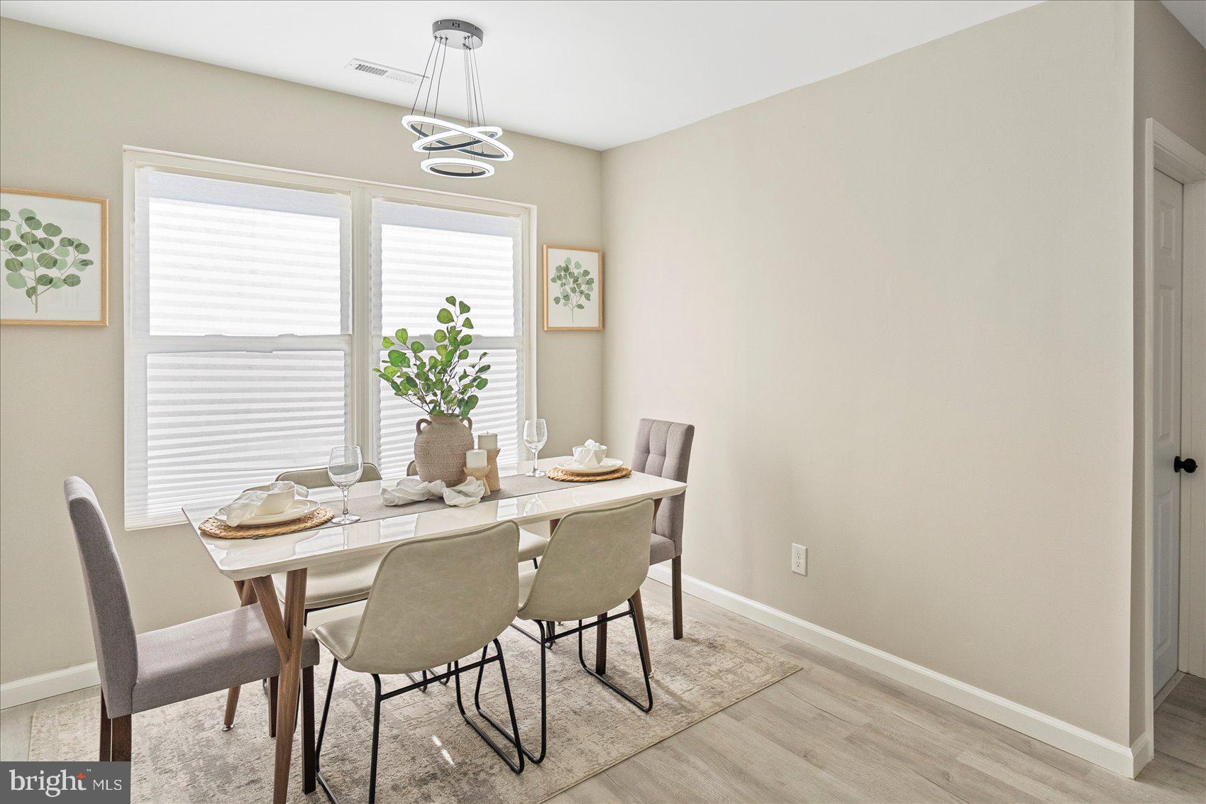 3466 Albantowne Way Edgewood, MD 21040 - Photo 15 of 36 a dining room with furniture and window