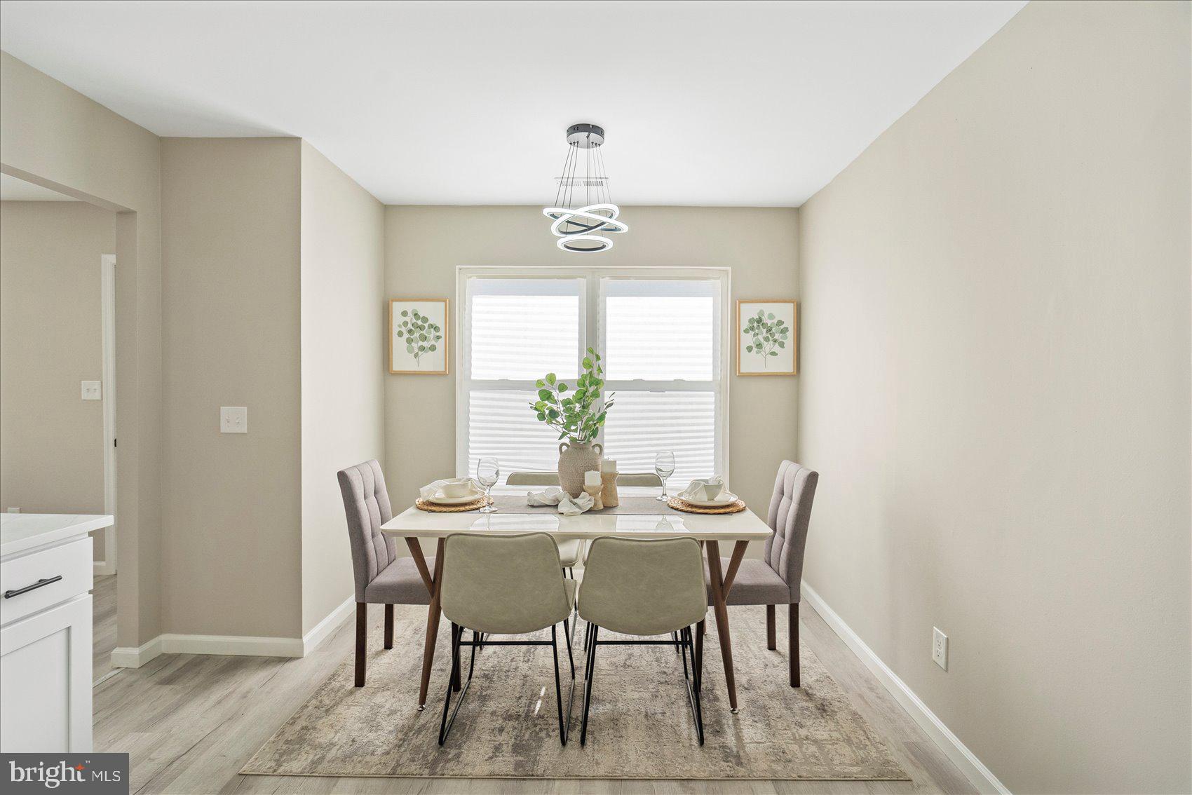 3466 Albantowne Way Edgewood, MD 21040 - Photo 16 of 36 a dining room with furniture and window