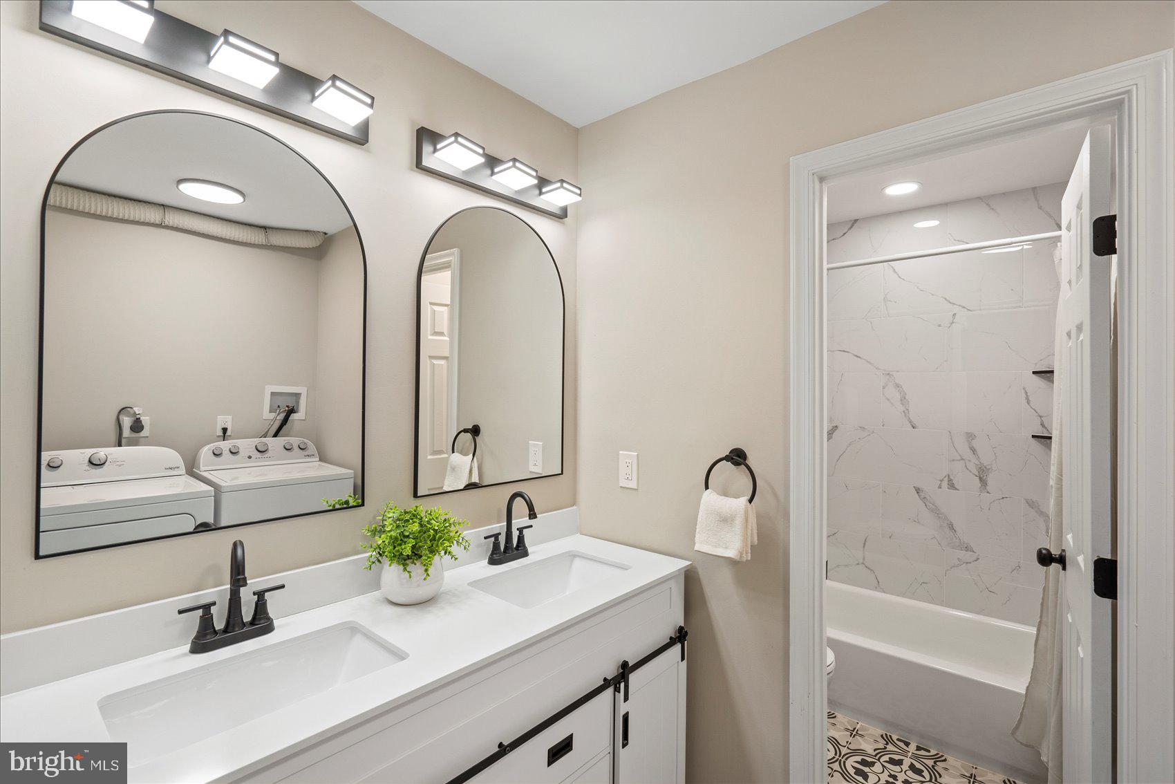 3466 Albantowne Way Edgewood, MD 21040 - Photo 17 of 36 a bathroom with a sink and a mirror