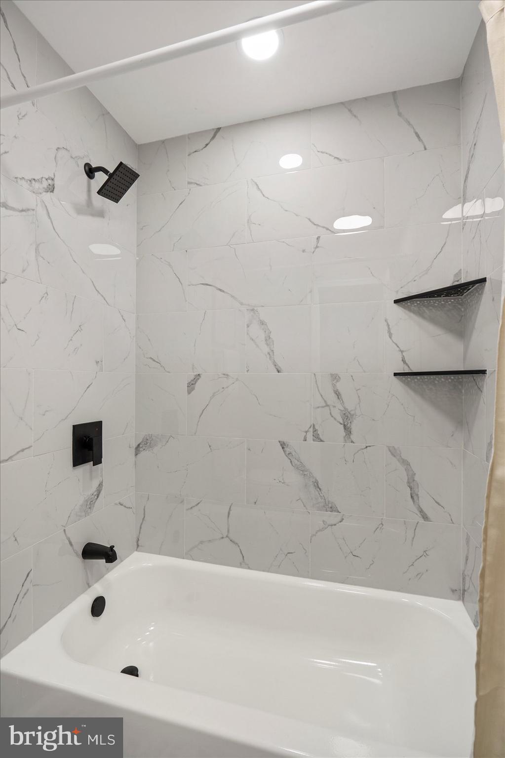 3466 Albantowne Way Edgewood, MD 21040 - Photo 19 of 36 a bathroom with a bathtub and a shower