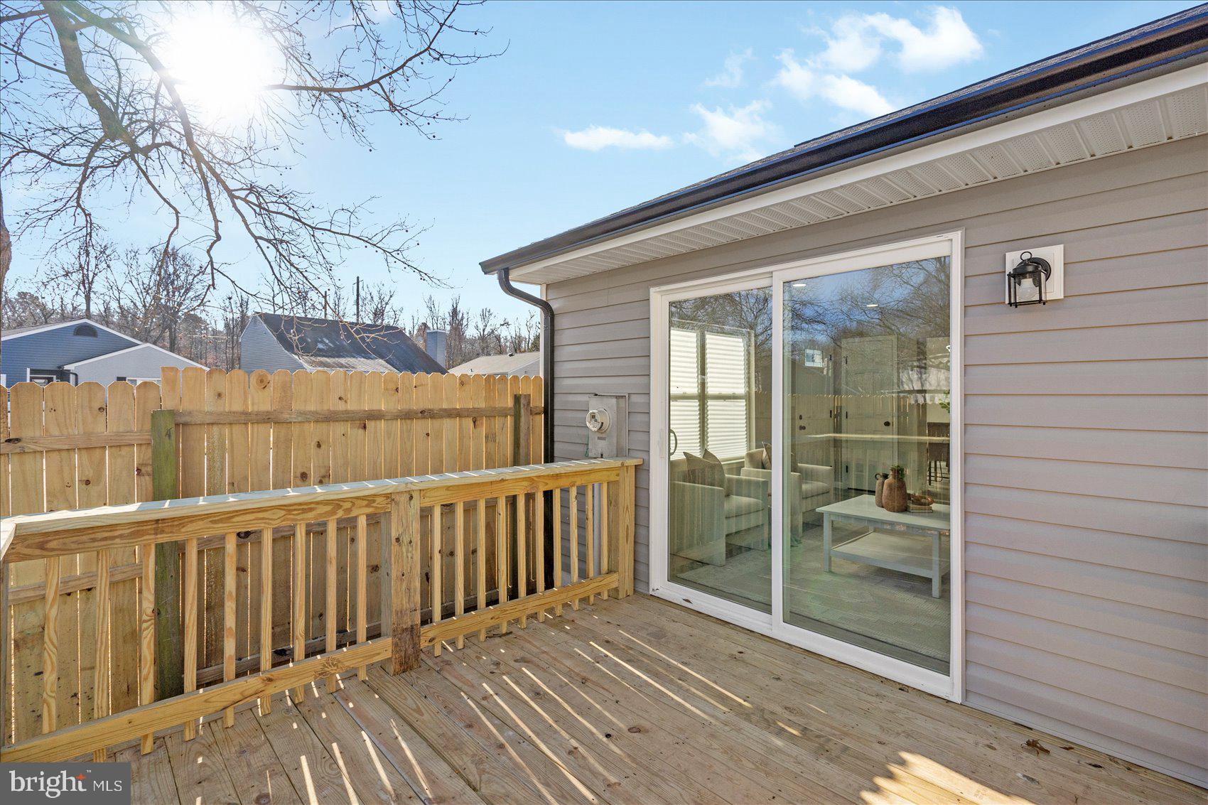 3466 Albantowne Way Edgewood, MD 21040 - Photo 31 of 36 a view of a balcony with wooden floor and fence