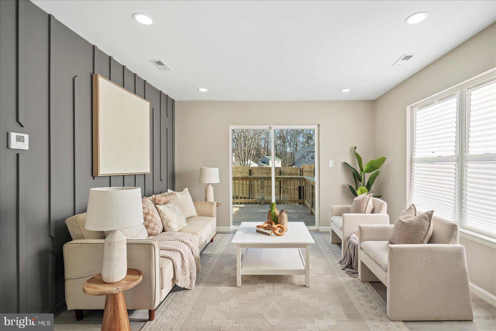 3466 Albantowne Way Edgewood, MD 21040 - Photo 4 of 36 a living room with furniture and a large window