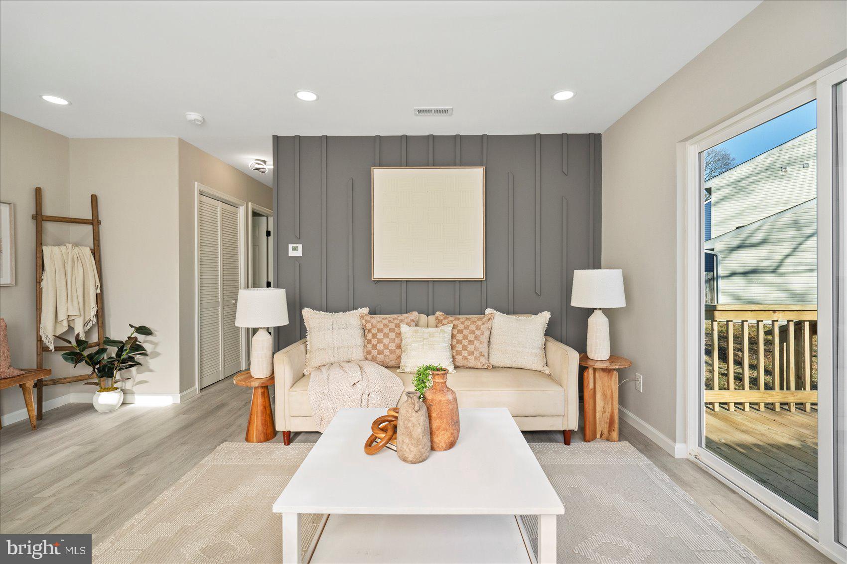 3466 Albantowne Way Edgewood, MD 21040 - Photo 6 of 36 a living room with furniture and a large window
