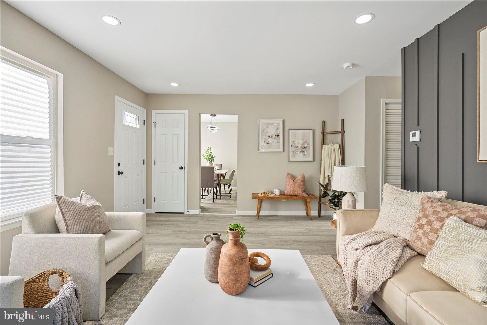 3466 Albantowne Way Edgewood, MD 21040 - Photo 8 of 36 a living room with furniture and a large window