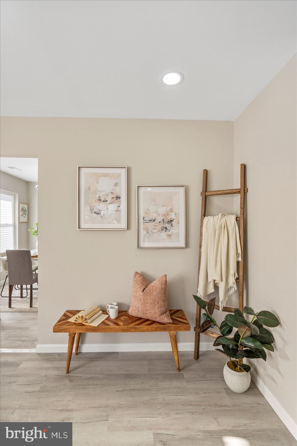 3466 Albantowne Way Edgewood, MD 21040 - Photo 9 of 36 a living room with furniture and a wooden floor
