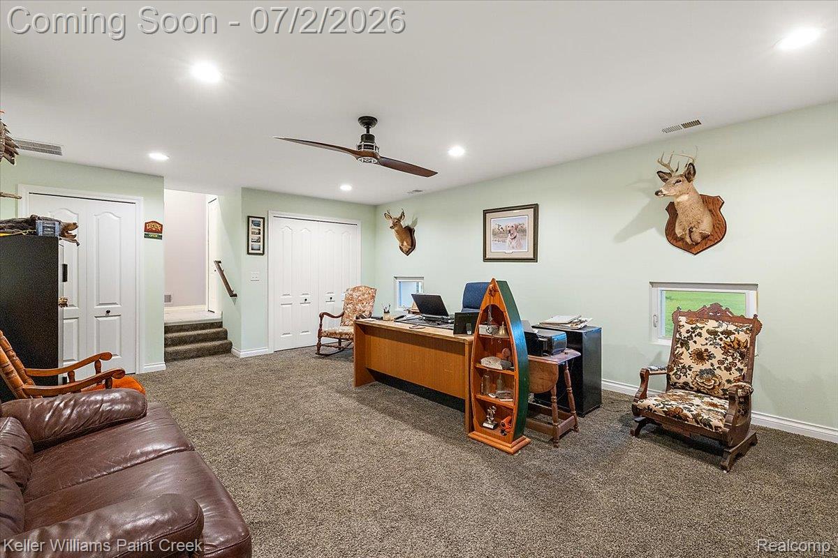 54230 Card Road Macomb, MI 48042 - Photo 59 of 73 Expansive carpeted room featuring recessed lighting, a ceiling fan, and light green walls