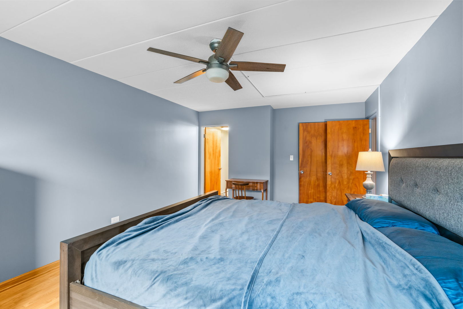 222 North Grove Avenue, Unit 2B Oak Park, IL 60302 - Photo 11 of 20 a view of a bedroom with window and a ceiling fan
