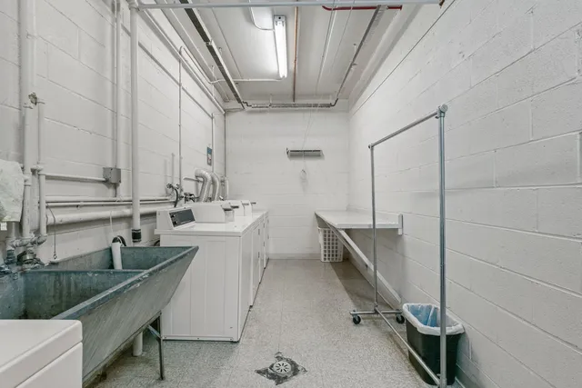 a kitchen with sink cabinets and window