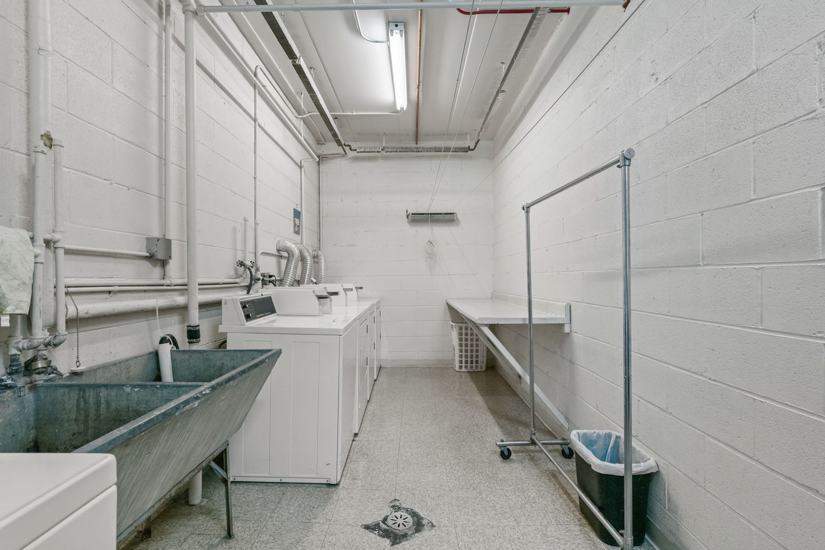 222 North Grove Avenue, Unit 2B Oak Park, IL 60302 - Photo 19 of 20 a kitchen with sink cabinets and window