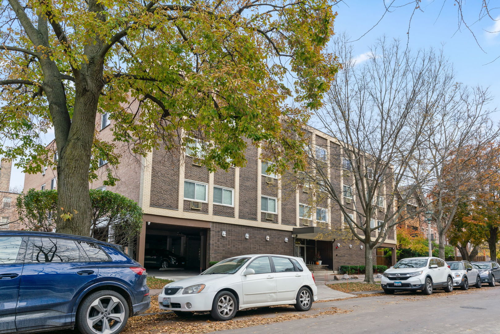 222 North Grove Avenue, Unit 2B Oak Park, IL 60302 - Photo 2 of 20 a car parked in front of a building