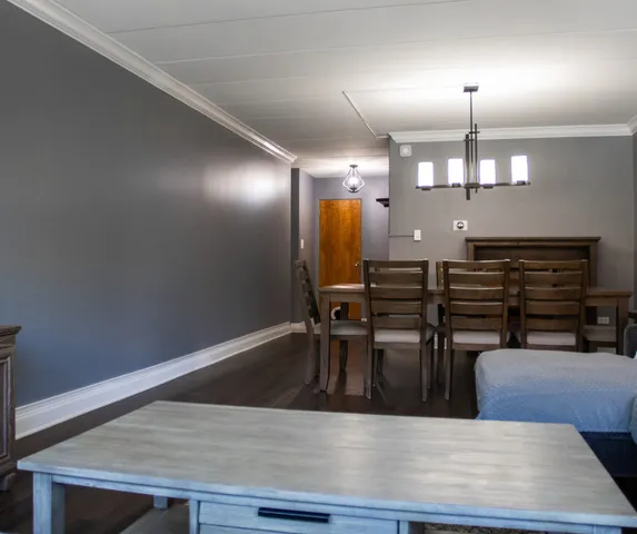 a view of a kitchen with cabinets