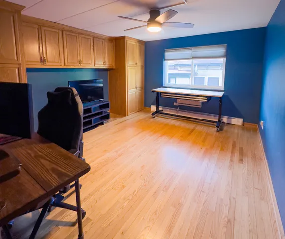 a kitchen with granite countertop a stove a sink and a refrigerator