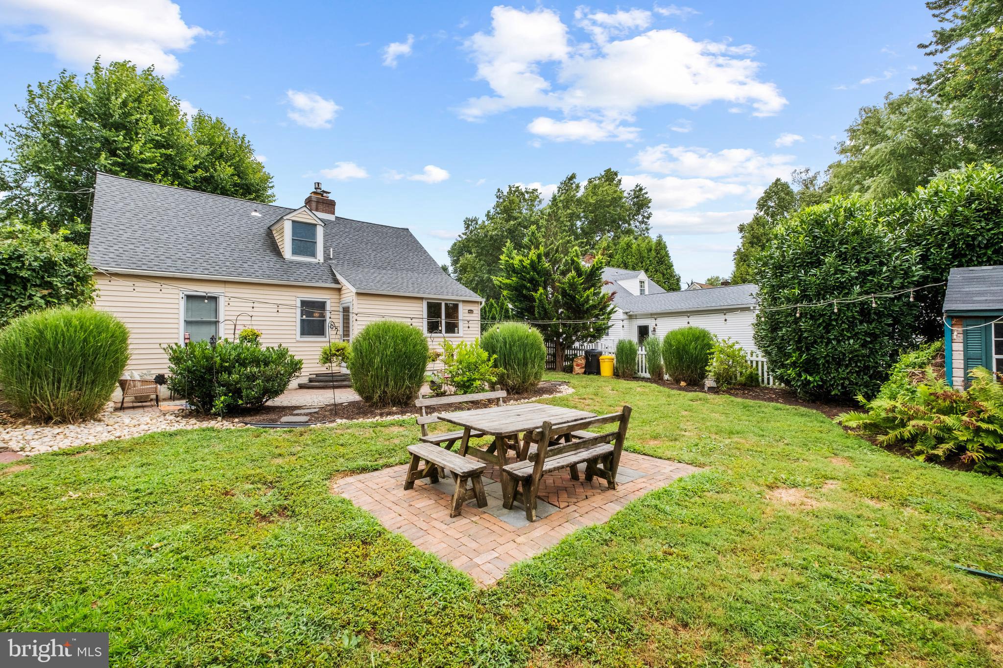 503 Burton Road Oreland, PA 19075 - Photo 5 of 29 a view of a house with backyard and sitting area