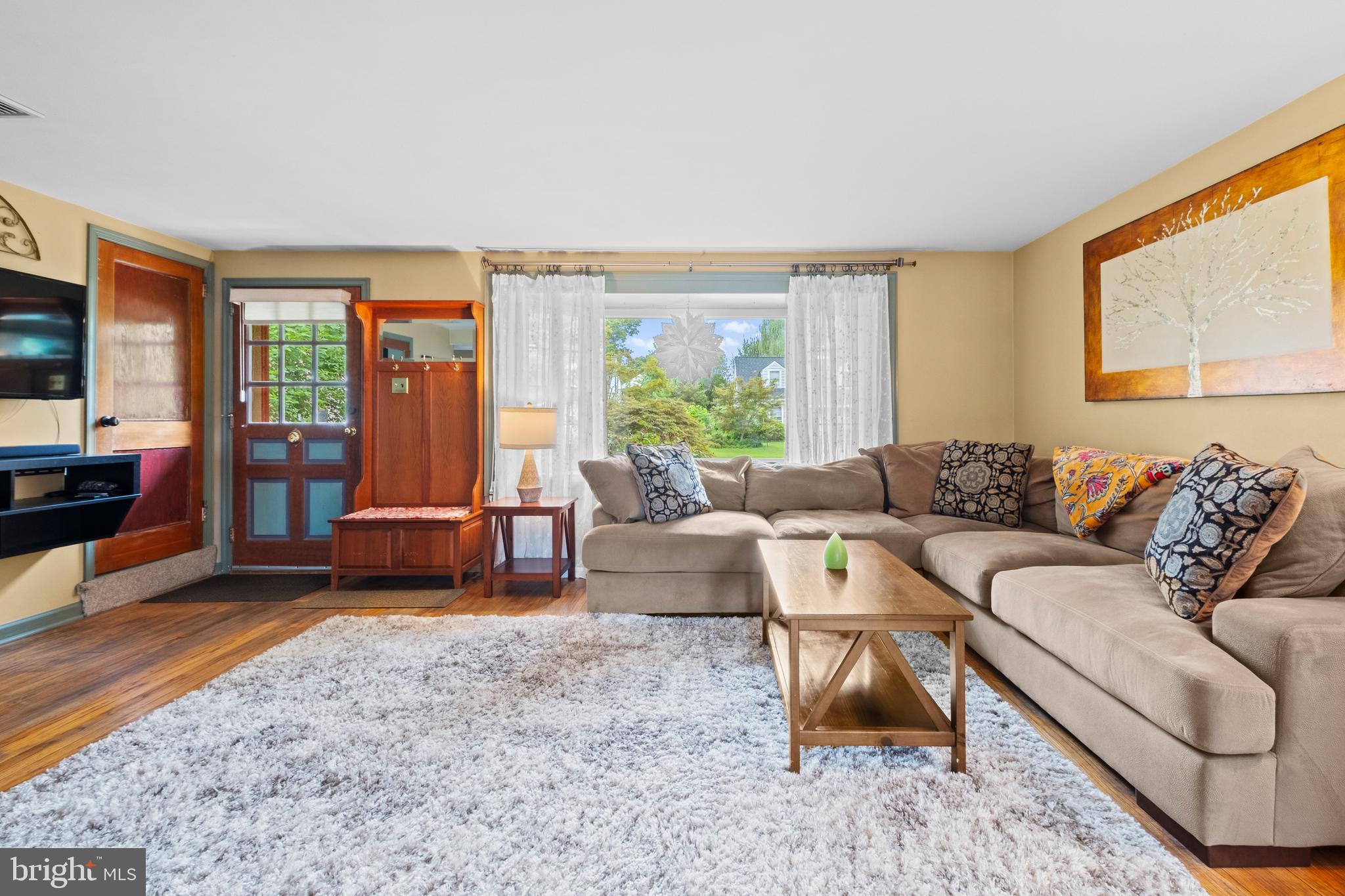 503 Burton Road Oreland, PA 19075 - Photo 8 of 29 a living room with furniture and a large window