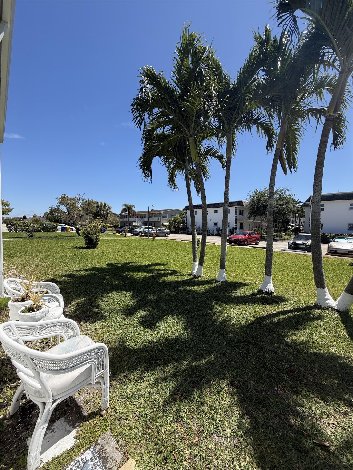 352 Sheffield O West Palm Beach, FL 33417 - Photo 1 of 18 a view of a park with a slide