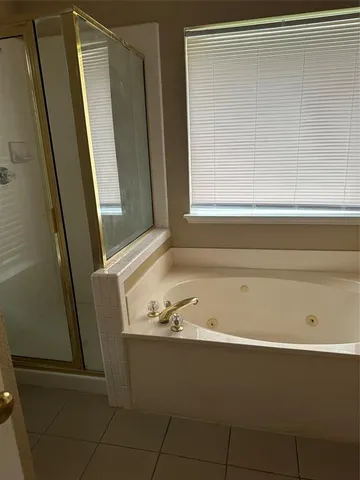 a kitchen with a stove and a microwave