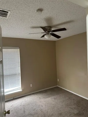 a view of small space with wooden floor