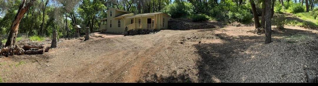 303 Stone House Road Auburn, CA 95603 - Photo 26 of 26 a view of a house with a yard