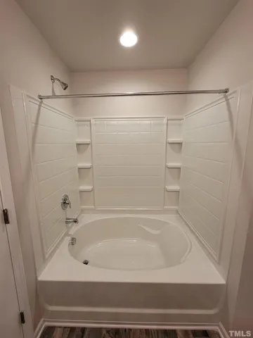 a bathroom with a bathtub