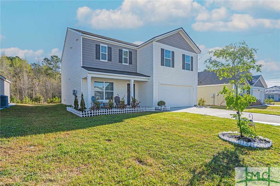 106 Aruba Road Guyton, GA 31312 - Photo 2 of 47 Left Front View