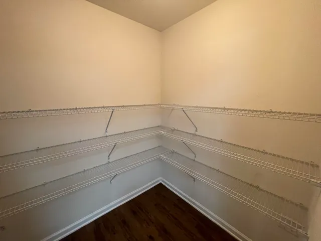 a view of a room with racks on the wall