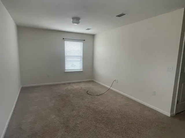 an empty room with a window