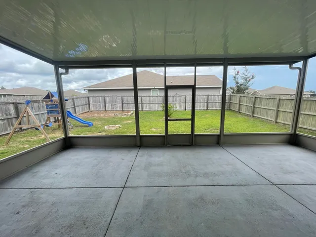 a view of an empty room with window