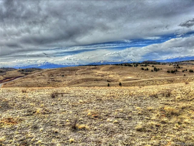a view of a lake with a mountain in the background