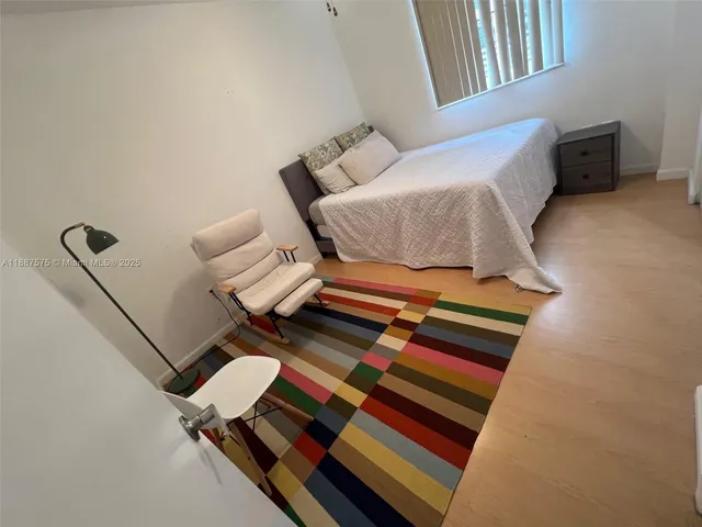 a bedroom with a bed