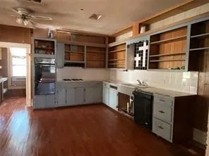 a view of room with a window and a sink