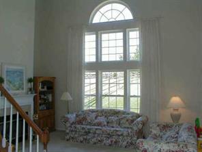 16015 Lavenham Road Huntersville, NC 28078 - Photo 2 of 8 a living room with furniture and a large window