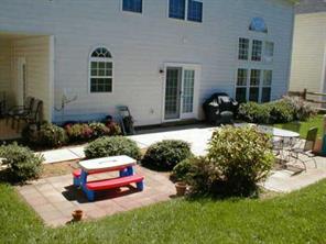 16015 Lavenham Road Huntersville, NC 28078 - Photo 6 of 8 a car parked in front of a house