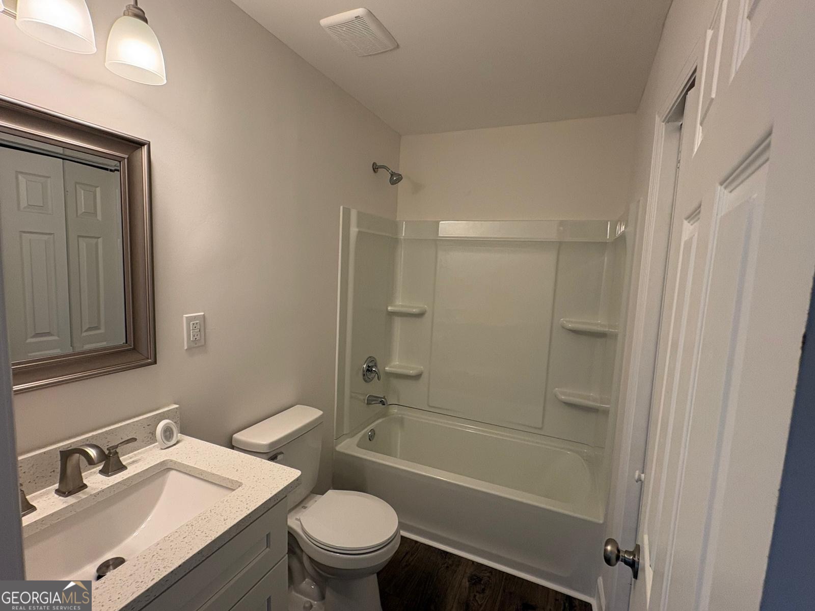 7724 Boulder Drive Columbus, GA 31909 - Photo 5 of 9 a bathroom with a sink a toilet and shower
