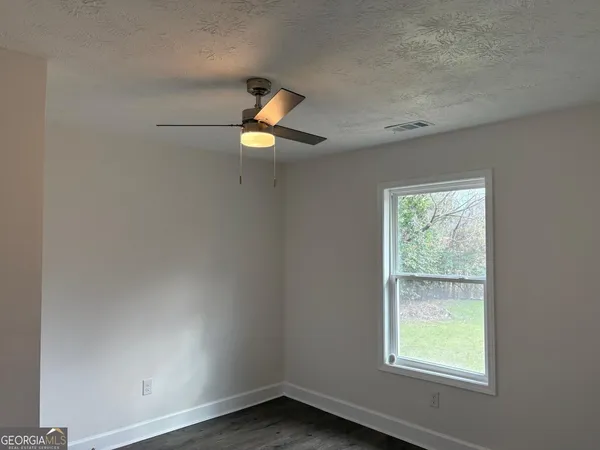 an empty room with window