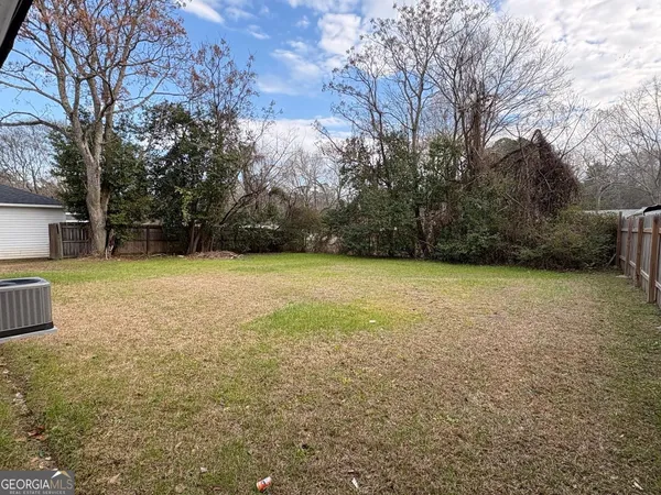 a view of a backyard with a garden