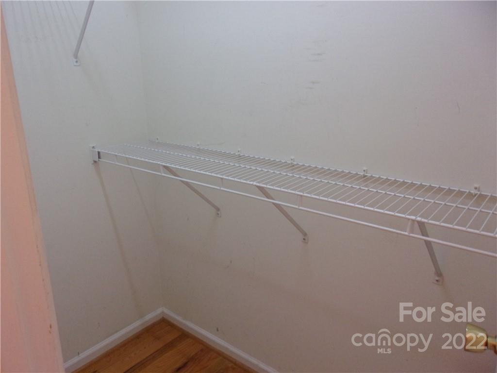 1059 South Castleview Road Salisbury, NC 28146 - Photo 15 of 34 a view of a room with racks on the wall