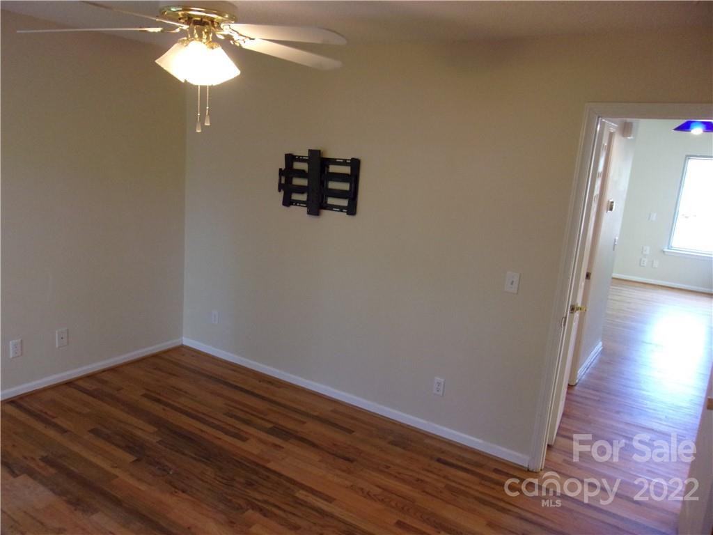 1059 South Castleview Road Salisbury, NC 28146 - Photo 20 of 34 a view of a hallway with a chandelier