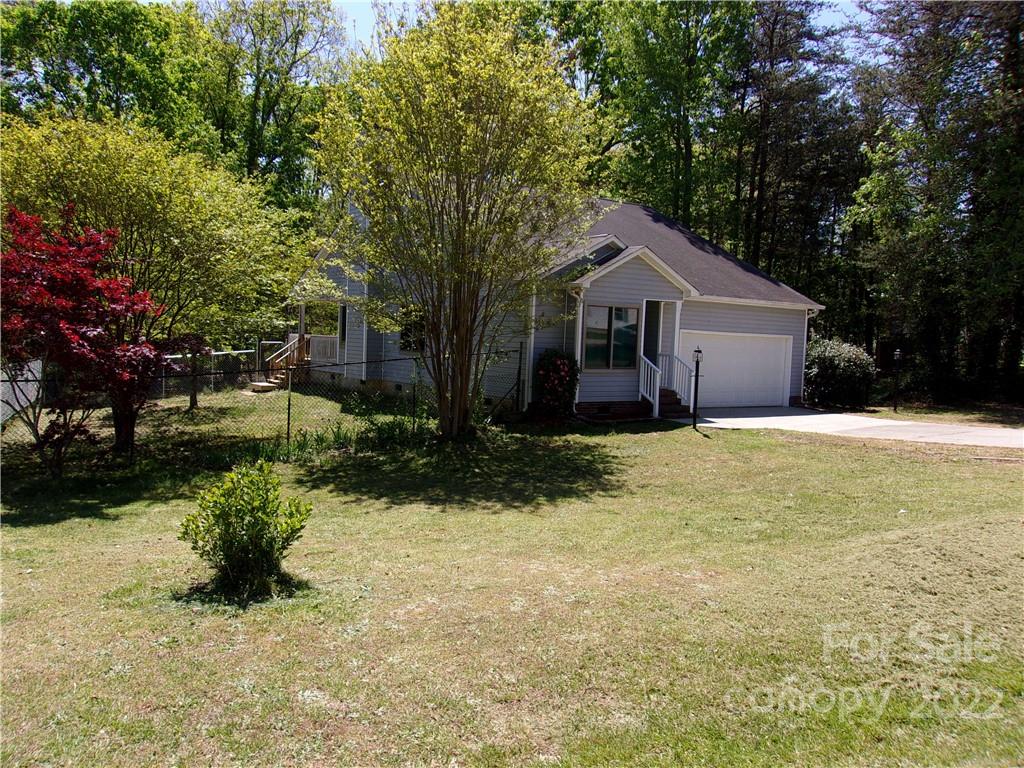 1059 South Castleview Road Salisbury, NC 28146 - Photo 2 of 34 a view of a house with a yard